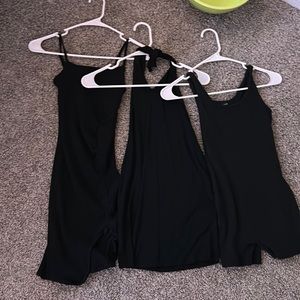 2 black dresses and one black romper